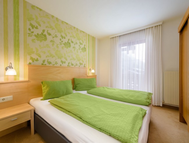 Schlafzimmer mit Balkon