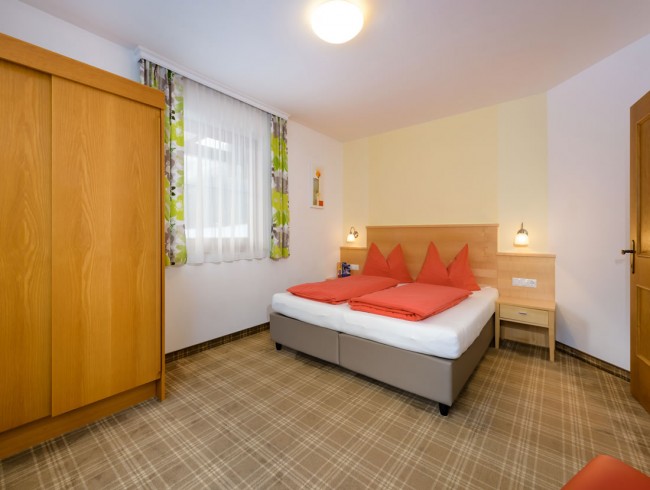 Schlafzimmer mit Balkon